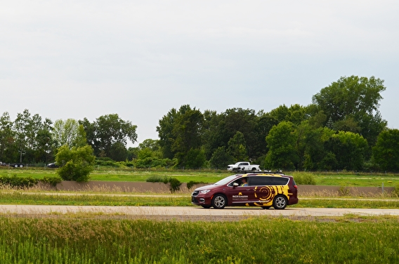 MnCAV vehicle driving on MnRoad test track